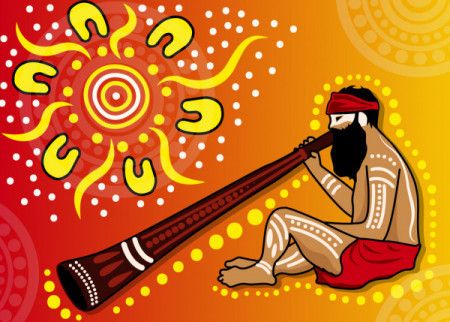 Aboriginal man playing a didgeridoo