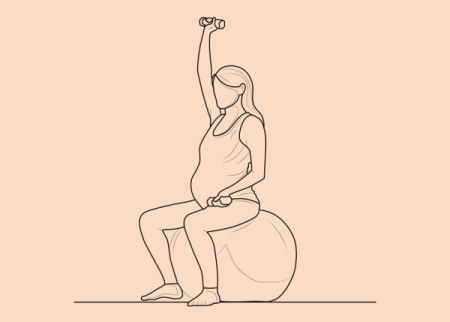 Pregnant woman line drawing with dumbbells and Swiss ball